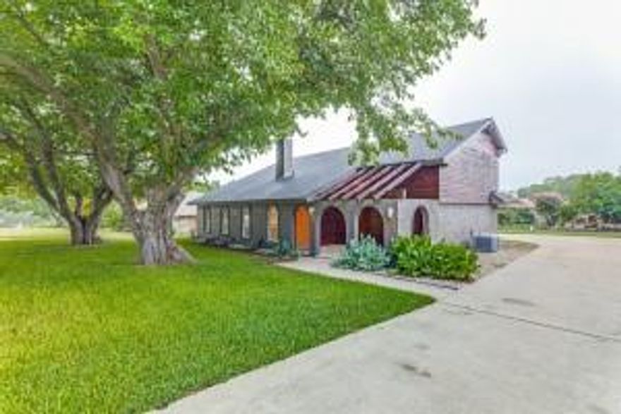 Bring your pickiest buyers to see this gorgeous Mid Century Modern design home. This home offers 3 bedroom, 2.5 bath home with beautiful designer elements throughout, Livingroom boasts of Open Staircase, Double sided floor to ceiling fireplace, Kitchen offers stainless appliances and granite countertops, Additional living media room upstairs, Inviting Outdoor Living area overlooking beautiful open backyard. Highly Sought after Lake Country Estates community offers private boat ramps, tennis courts, pickleball courts, park, walking trails, greenbelt. Located close to shopping and major roadways