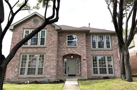 Photo of 2112 Stonegate Drive, Carrollton, TX 75010 (MLS # 21218950)