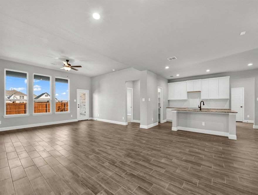 MLS# 21239232 - Built by Taft Homes - Jul 2026 completion! ~ This stunning, contemporary residence, slated for completion in July 2026, boasts an impressive 3,017 square feet of living space. Featuring five spacious bedrooms and four full bathrooms, this home is designed for comfort and modern living. The open floorplan highlights decorative lighting, 3cm granite counters, and a kitchen island, perfect for entertaining. Enjoy the convenience of high-speed internet and a smart home system. Dual living areas and a dining space create an inviting atmosphere, while the covered patio offers a serene outdoor retreat. Additional features include vaulted ceilings, walk-in closets, and energy-efficient heating and cooling systems. Nestled in the desirable Summer Crest subdivision within Crowley ISD, this home is a true gem waiting to be personalized. Don't miss this opportunity to own a slice of modern luxury!
