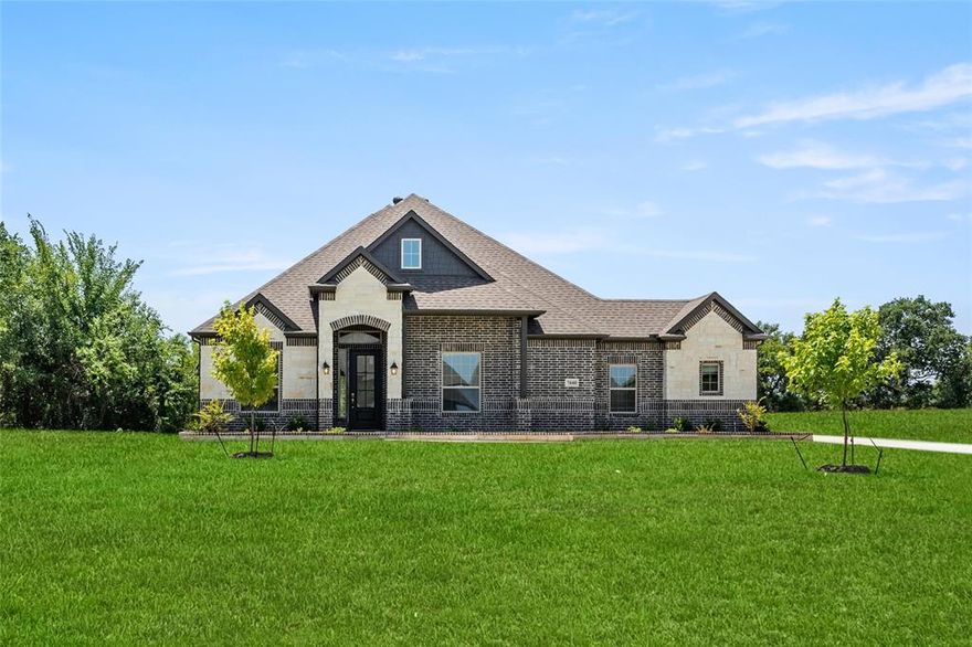 MLS# 20335735 - Built by Sandlin Homes - Ready Now! ~ This Nottingham I home comes with 3 bedrooms, 2.5 bathrooms, a study, dining room, bay windows in the owners suite, outdoor fireplace, large utility room and a 2-car garage. This home is designed with 3cm quartz countertops, stained wood cabinets, upgraded carpet, laminate and tile flooring, tiled fireplace, and upgraded wall tile. Contact us to learn more about our incentives!