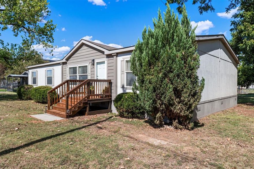 This is a wonderful permanent residence or a fantastic getaway for the family! This home sits on two lots, on the water! The home is in excellent condition! The large master is by itself and has vaulted ceilings, a huge bathroom, double vanities, and dual closets! The other three bedrooms are split, and one of them is 11 x 15! The floor plan is open with vaulted ceilings, so family can all enjoy being together at the lake! The kitchen is huge with stainless appliances! There is a large deck in back, facing ENE for shaded afternoons, with a sizable yard! Really a great find, and ready for immediate enjoyment!