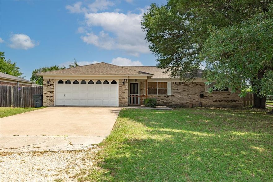 Welcome to 178 Norwood Drive, a well cared for and truly move in ready home tucked into one of the most desirable and affordable pockets of Woodway, known by locals as Speegleville.. Located in Midway ISD with easy access to both HWY 6 and Speegleville Road, this quiet neighborhood puts you minutes from everything in Waco and Woodway while still offering privacy and a peaceful setting. Inside, the traditional floorplan provides well defined spaces that still flow naturally. A cozy fireplace anchors the spacious living room, which opens to the dining area and kitchen with granite countertops and plenty of storage. The primary suite is split from the secondary bedrooms, creating a private retreat with its own full bath. Updated flooring and fresh cosmetic touches throughout mean the home already feels updated and move in ready. Out back, the large yard with healthy grass offers plenty of space to relax, play, or entertain. Affordable homes in Midway ISD at this price point are rare. Whether you are a first time buyer, downsizer, or just want a great neighborhood without overspending, this home delivers comfort, convenience, and value in one of the most sought after areas in the Waco market.