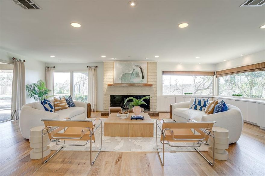 Welcome to 3725 Autumn Drive! This stunning Mid-Century and single-level home sits above Overton Park with bluff views to the southwest. Situated on approximately 1.4 acres,  the well-appointed windows allow a perfect view across treetops. Meticulously updated to maintain the original architecture. An entertainer’s dream, this home boasts a true chef’s kitchen with stainless appliances, double ovens, and skylights, with wet bar and butler pantry connected to dining spaces. The primary retreat has floor to ceiling windows with doors leading to private courtyard space and a large ensuite bathroom with separate soaking tub and walk-in shower, double closets, custom built-in cabinetry and separate sink with two vanity areas. Secondary bedrooms also have floor to ceiling windows with gorgeous views of the grounds. The style of this home and the breathtaking views are truly one-of-a-kind in Fort Worth!