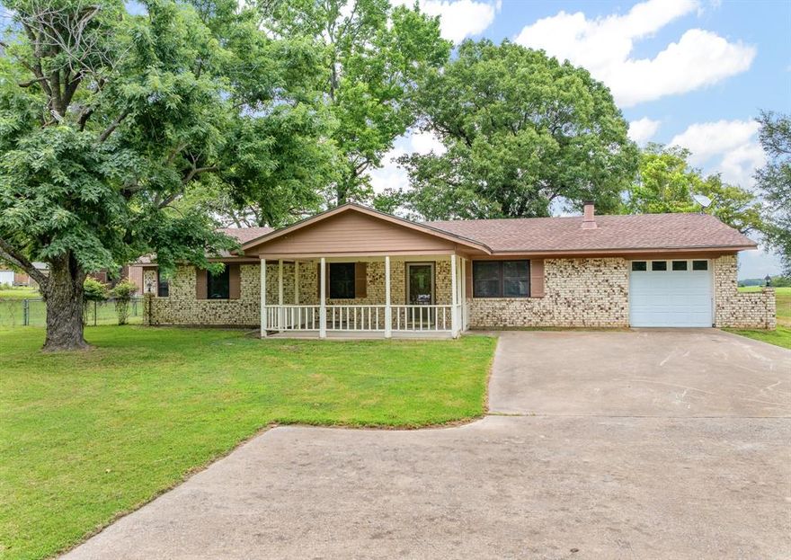 Welcome to this spacious 4 bedroom, 3 bathroom home nestled on 7.35 AG EXEMPT acres just outside of Canton, TX. Whether you're looking for peaceful country living, a place to run your business, or both, this property has it all! Step inside and you'll find beautiful hardwood floors, a warm and inviting living room with a wood-burning fireplace, and a second cozy fireplace in the primary bedroom. The kitchen is generously sized with ample cabinet and counter space, perfect for preparing meals or entertaining guests. A one-car garage adds extra convenience. Outside, the property truly shines with a large barn complete with horse stalls and ample storage. The land is cross-fenced, ideal for horses, cattle, goats, or any of your animals. With AG exemption already in place, you can enjoy the benefits of country life with lower taxes. Looking for potential income or commercial opportunity? This property is unrestricted and could easily be transformed into a storage facility, RV park, horse boarding operation, wedding venue, tiny home community, or even a home-based business hub. Located just minutes from the heart of Canton and a short drive from I-20, this property offers the perfect balance of rural charm and accessibility. Don't miss your chance to own this versatile East Texas gem!