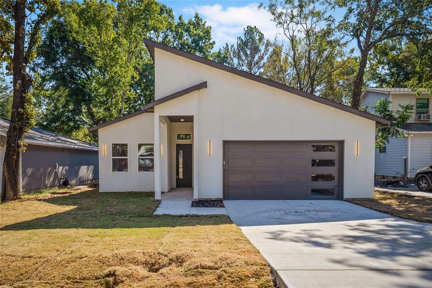 No HOA and 0% Down Payment! Step into this modern, luxurious new build just 17 minutes from Downtown Dallas! With over $40,000 in premium upgrades, this 4-bedroom, 2.5-bath home offers the perfect blend of style, comfort, and convenience. Built on a 50-foot lot, this home features a sleek contemporary design that stands out with clean lines, high-end finishes, and an open-concept layout. The spacious interior is ideal for entertaining or relaxing, with abundant natural light and designer touches throughout. Whether you're a first-time homebuyer, an empty nester, or a young professional looking to be close to the city, this home delivers unmatched value and modern charm in a rapidly growing area. Don’t miss your opportunity to own a piece of luxury in Dallas. Schedule your tour today!