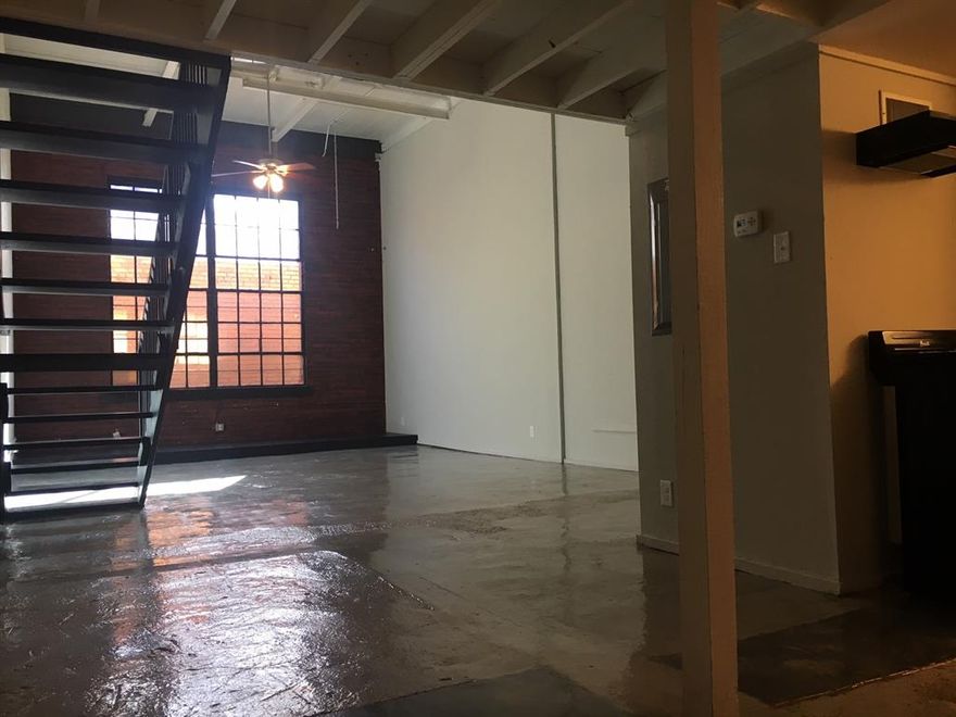 Come live in our remodeled industrial building, which has been transformed into split-level residential lofts. Each unit has its own distinct characteristics. All units have recycled glass counters and concrete flooring, exposed brick, and an open floor plan.