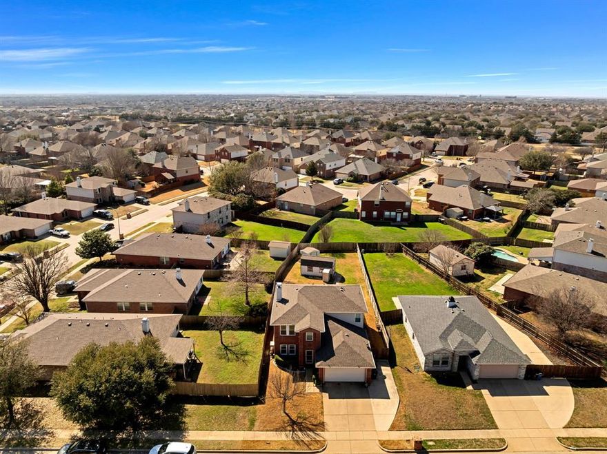 Welcome home to this beautifully updated property in a prime location close to shopping, restaurants, schools, and scenic walking trails. Recent improvements include new carpet, commercial grade vinyl flooring, new tile in the utility room, and fresh interior paint throughout. The kitchen features abundant cabinetry, granite countertops, and generous workspace for all your cooking needs. The sunroom is equipped with its own split AC and heat unit, creating a perfect year-round space for plants, hobbies, or relaxation. A 2022 roof, sprinkler system, and security system with cameras provide peace of mind, and a new Wate Heater. Upstairs, a spacious flex room offers endless possibilities—game room, home gym, media room, or more. The primary suite includes a double shower and a large walk-in closet. All windows are less than five years old.The fully fenced backyard offers privacy and includes two storage buildings 10×20 and 8×10 for tools, equipment, or hobbies. Extra driveway parking adds convenience. Radiant barrier and extra insulation added in the attic. This move-in-ready home has been exceptionally well cared for and truly checks all the boxes!