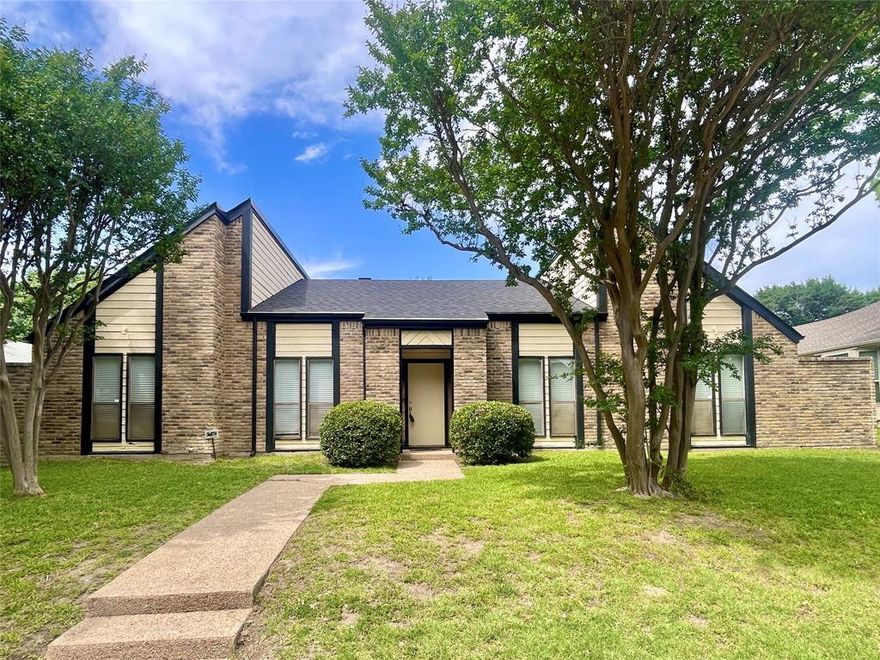 Step into this spacious and inviting home featuring a functional layout with generous living area space, and timeless character. With 4 bedrooms and 3 full bathrooms and over 2600 square feet, there's plenty of room for comfortable living and entertaining. Don't miss the double sided wood fireplace and timeless wet bar. The mature trees and charming exterior create a welcoming first impression, while the interior offers endless potential for you to make your own. Enjoy the beautiful back patio and yard with large storage shed. Ideal for buyers seeking space, character, and value in a well-established neighborhood with highly rated schools. New Roof.