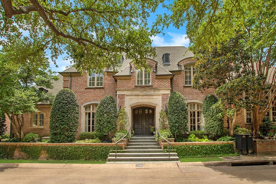 Nestled in a prime location on a generous 68x142 corner lot in the heart of Caruth Village, this stunning showplace by Gage Homes epitomizes timeless elegance and unparalleled craftsmanship. Blending classic traditional design and modern luxury, the home creates an inviting sanctuary in one of Dallas' most sought-after neighborhoods. From the moment you enter through the gracious center entrance hall, you are enveloped in a world of sophistication. 10-foot ceilings, rich hardwood floors, impeccable millwork set the tone throughout the light-filled interiors. Perfectly scaled for both grand entertaining and intimate gatherings, the exquisite dining room and richly paneled study speak to traditional elegance, while the expansive living room impresses with an antique French mantel, a wall of windows that provide serene views of the private patio oasis—complete with a spa, tranquil fountains, and ample space for entertaining. The spacious chef’s granite island kitchen showcases premium Thermador and SubZero stainless appliances, abundant custom cabinetry, a breakfast bar, butler’s and walk-in pantries and a cozy den with direct patio access—creating a seamless indoor-outdoor experience. Featuring a soaring vaulted beamed ceiling, the luxurious downstairs primary suite is a true retreat, offering access to the outdoors and an indulgent marble bath with dual vanities and water closets, a jetted tub, separate shower and expansive walk-in closet. Upstairs, two generously sized guest suites—each with a tray ceiling and its own elegant ensuite bath—are joined by a sprawling game room featuring custom built-ins and a full bath, offering flexibility for media, play, or additional living quarters.
A rare blend of beauty and function, this home is complete with a two-car attached garage, exceptional storage throughout and a location that simply cannot be overstated—moments from the heart of Dallas’ city’s finest shopping, dining, and cultural offerings.