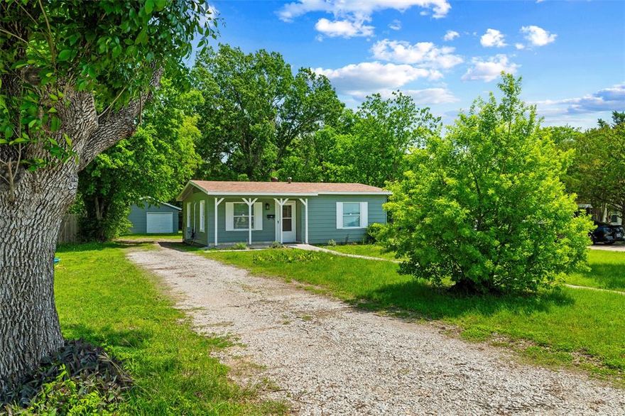 Welcome home to this refreshed beauty! Recent updates include interior & exterior paint, remodeled kitchen and bathroom, flooring throughout, efficient Mini-Split HVAC system for heating and cooling, light fixtures, ceiling fans, blinds throughout, front porch tile and a 2025 roof. Abundant natural light fills this comfortable 2 bedroom, 1 bath home. Step outside to a spacious patio and huge backyard, perfect for the avid gardener, bird-watcher, soccer-ball-kicker, or cartwheel enthusiast. Want to host a summer BBQ for the extended family? There's room for everyone -- grandma & grandpa, great aunt Mary, that favorite uncle and your second cousins, once removed. Savor your coffee or iced tea on the covered front patio, rain or shine! A detached garage with electricity enables covered parking or flex space for workshop, hobbies, parties, storage and more!  Floorplan includes accessible doorways to a bedroom and bathroom. Convenient to shopping, dining, parks, & schools. Just minutes to Cedar Valley College and Lancaster Community Park, Rec Center, and Sports Complex. 25 minute commute to Downtown Dallas. Listing Agent is related to Sellers and has an ownership interest in the property. All listing information is deemed reliable; Buyer and Buyer's Agent to verify.