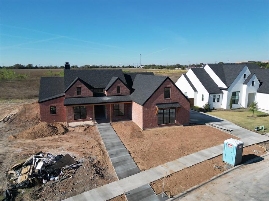 Nestled within the prestigious Tanglewood Estates subdivision in Woodway, TX, this property offers a remarkable blend of contemporary design and timeless elegance. With 5 bedrooms, 3.5 bathrooms, and a versatile flex space upstairs, this home is a perfect match for modern family living. The heart of the home is a beautifully designed kitchen that features stainless steel appliances, modern cabinetry designs, and an island that overlooks the living room and gas fireplace. The main floor boasts 3 bedrooms, an office, and a primary suite with a luxurious shower, freestanding tub, and walk-in closet. The second floor features a flex space that can be customized to suit your lifestyle - use it as a home office, media room, or a playroom for the kids. Families residing in Tanglewood Estates have the advantage of the natural gas options, sidewalk lined streets, a 3 acre park, 1 acre pocket parks, and being a part of the esteemed Midway Independent School District. With its spacious layout, top-notch schools in the Midway ISD, and a vibrant dining scene, this property offers the perfect blend of comfort, style, and convenience for your family's next chapter.

BUYER CAN STILL CUSTOMIZE - UNDER CONSTRUCTION - PROJECTED COMPLETION JAN 2026 OR EARLY FEB 2026