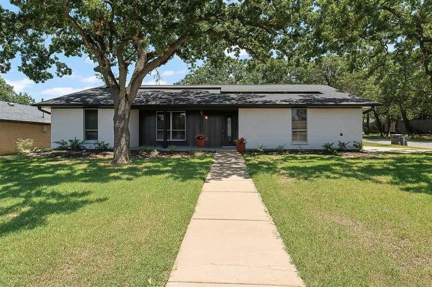 PAID for SOLAR PANEL SAVINGS! Welcome to this charming 4-bedroom, 2-bath home situated on a desirable corner lot in Arlington, Texas. Nestled within the highly sought-after Martin School District, this property presents an exceptional opportunity in a prime location. Just minutes from Lake Arlington, shopping, dining, and major highways, this home provides the perfect balance of convenience and comfort. With easy access to Interstate 20, commuting to Dallas or Fort Worth takes only about 30 minutes, making it an excellent choice for those seeking a central location. All cast iron plumbing removed and replaced with PVC, no worries here! New fresh paint inside and outside!
From the moment you arrive, you’ll be welcomed by the inviting front porch and a great back porch offers additional space for entertaining, whether hosting gatherings or simply enjoying the peaceful outdoor setting. Inside, the home features a well-designed layout with ample living space, making it ideal for families. Notable improvements Foundation has been repaired, no cast iron plumbinG & new hot water heater 

The kitchen boasts a sleek backsplash tile that complements the space beautifully, new appliances, adding a modern touch to the heart of the home. The open design allows for easy flow between the kitchen and living areas. The bedrooms are generously sized, providing comfort and flexibility to meet your needs. New Wood Vinyl Plank floors!

For added convenience, the home includes a side-swing garage, enhancing both functionality and curb appeal. One of the most valuable features of this property is the $40,000 worth of fully paid-off solar panels, offering long-term energy savings and efficiency, a great benefit for environmentally conscious homeowners or investors.

With its combination of charm, location, and valuable upgrades, this home is a fantastic opportunity waiting to be claimed
