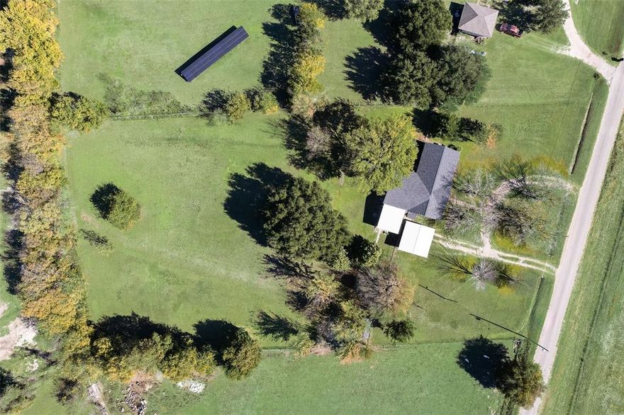 Charming 3 bedroom, 2 bathroom home situated on two peaceful acres.  This well-maintained property features a functional floor plan with defined living spaces, an office or craft room, and spacious bedrooms.  Enjoy a comfortable living area, inviting kitchen, and plenty of natural light throughout.  The large lot provides ample space for outdoor activities, gardening, or future expansion.  Perfect for those seeking country living with convenience and comfort.