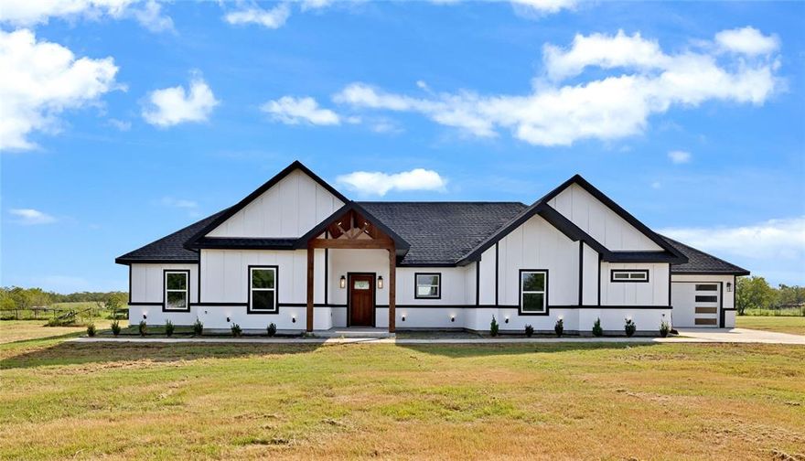 Welcome to this stunning new-construction farmhouse perfectly situated on just over an acre, offering the perfect blend of modern comfort and country charm. Featuring 4 spacious bedrooms and 2 beautifully designed bathrooms, this home provides ample space for family and guests.
Step inside to an open-concept floor plan that seamlessly connects the living, dining, and kitchen areas—ideal for entertaining or everyday living. A large wet bar adds a touch of luxury and convenience, perfect for hosting gatherings.
Tall windows throughout the home fill each room with abundant natural light, highlighting the elegant finishes and creating a warm, inviting atmosphere. With its thoughtful layout and attention to detail, this farmhouse is designed for both style and functionality.
Set on a little more than an acre, you’ll enjoy plenty of outdoor space for recreation, gardening, or simply relaxing and taking in the peaceful Texas surroundings.
This property is more than a home—it’s a lifestyle. Don’t miss your opportunity to own this beautiful new farmhouse in Kaufman!