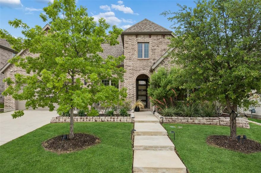 Discover refined living in this beautifully designed 3-bedroom, 3-bath residence in McKinney, where modern elegance meets everyday comfort. Situated on a desirable 70-foot lot—one of only a few 3-bedroom homes in the neighborhood with this added space—this property offers both distinction and functionality. Inside, a spacious living room with a vaulted ceiling creates an airy, light-filled setting ideal for relaxing or entertaining. The open-concept design flows seamlessly into a chef-inspired kitchen, thoughtfully appointed with a 6-burner gas range, double oven, integrated griddle, large island with seating, built-in appliances, designer lighting, and abundant storage. A bright breakfast nook enhances this inviting central space. A dedicated home office provides flexibility for work or creative use. Generously sized rooms throughout the home add to the sense of comfort and openness. The primary suite serves as a private retreat, featuring a spa-inspired bath with dual sinks, separate vanities, a soaking tub, and a dual shower with both a rain head and wall-mounted fixture, along with a spacious walk-in closet. Additional features include a well-appointed laundry area and a versatile oversized wash station for everyday tasks or outdoor cleanup. The home is equipped with modern technology, including pre-wired speakers in the home, garage, and patio with an additional run to the yard, wireless access points for whole-home WiFi, and prewiring for PoE security cameras. Enjoy the private backyard with a covered patio and natural gas connection, ideal for outdoor cooking and gathering. Located in a sought-after community with appealing amenities and convenient access to parks, shopping, and dining, this home offers a well-rounded lifestyle of comfort and convenience. 3D tour and video available online.