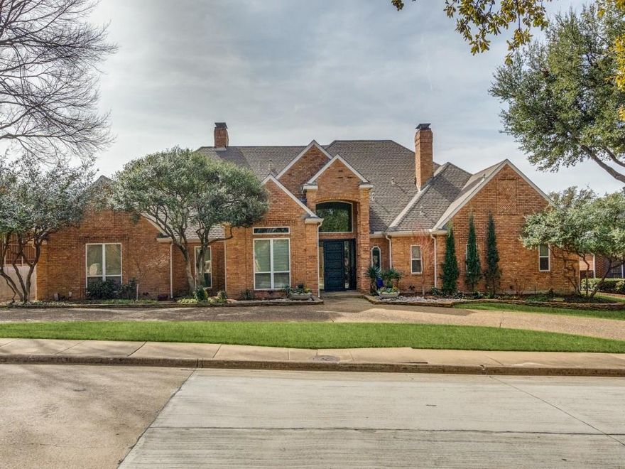 Rare one story 5 bedroom home in desired Briar Ridge Estates located in Dallas on a third acre lot with almost $400,000 of improvements since current owner purchased. The stately drive up has a circular drive, professional landscaping and welcoming entry leading into a stylish, thoughtful and cohesive whole home design. The sleek kitchen has an oversized waterfall island with ample storage, stainless steel appliances including a gas cooktop and double ovens. The inviting great room and solarium are awash with natural light and overlook the backyard oasis. The private primary suite, split from the other rooms, has a fireplace and luxurious his and hers separate bathrooms with a connecting pass through steam shower, pedestal soaking tub, dual vanities and his and hers closets. The media room is adjacent to a gaming area and chic wet bar with access to the backyard. The updated bathrooms are appointed with complementary materials creating continuity throughout. Enjoy morning coffee, evening libations or a quiet moment in the quaint courtyard off the formal dining room. The heated pool and spa area includes a pergola-covered outdoor kitchen, privacy fence, two offset cantilever patio umbrellas and custom landscaping creating a haven for recreation and a respite from daily life. High ceilings, replacement windows, 3 car garage, wood flooring, abundant closet and storage space including a cedar closet, indoor Sonos sound system, Ring camera with exterior security cameras and Plano ISD schools are just several of the many amenities in this exceptional home.