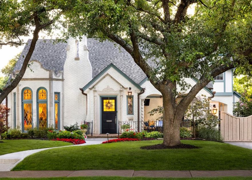 Restored and expanded 1927 Dines & Kraft Spanish Eclectic Tudor in heart of Lakewood! Complete remodel by Maestri Studio w all new systems - finished in fall 2019. Front living maintains orig plaster molding, vaulted ceilings, statement stained glass windws and Rookwood Aztec pattern fireplace. Owners added a 2nd story and expanded the footprnt of the downstrs to dble the sqftage. Main home ft master suite, formals and study down along w 3 full bedrms upstairs, playroom and media rm. Detached renovated casita has kitchen + bath. Kitchen reimaged into an open concept includ waterfall quartzite island, designer lighting, Sub-Zero and Wolf appliances and walk-in pantry. Bar area off kitchen feat amazing light, custom cabinets and orig Monday Morning tile. Oversized 83 x 150 lot ideal entertaining w 2 covered porches, outdoor kitchen, turfed yard w putting green and sep courtyard oasis w fountain and fireplace. Feat on the 2021 Lakewood Home Tour, this home is quintessential Lakewood.