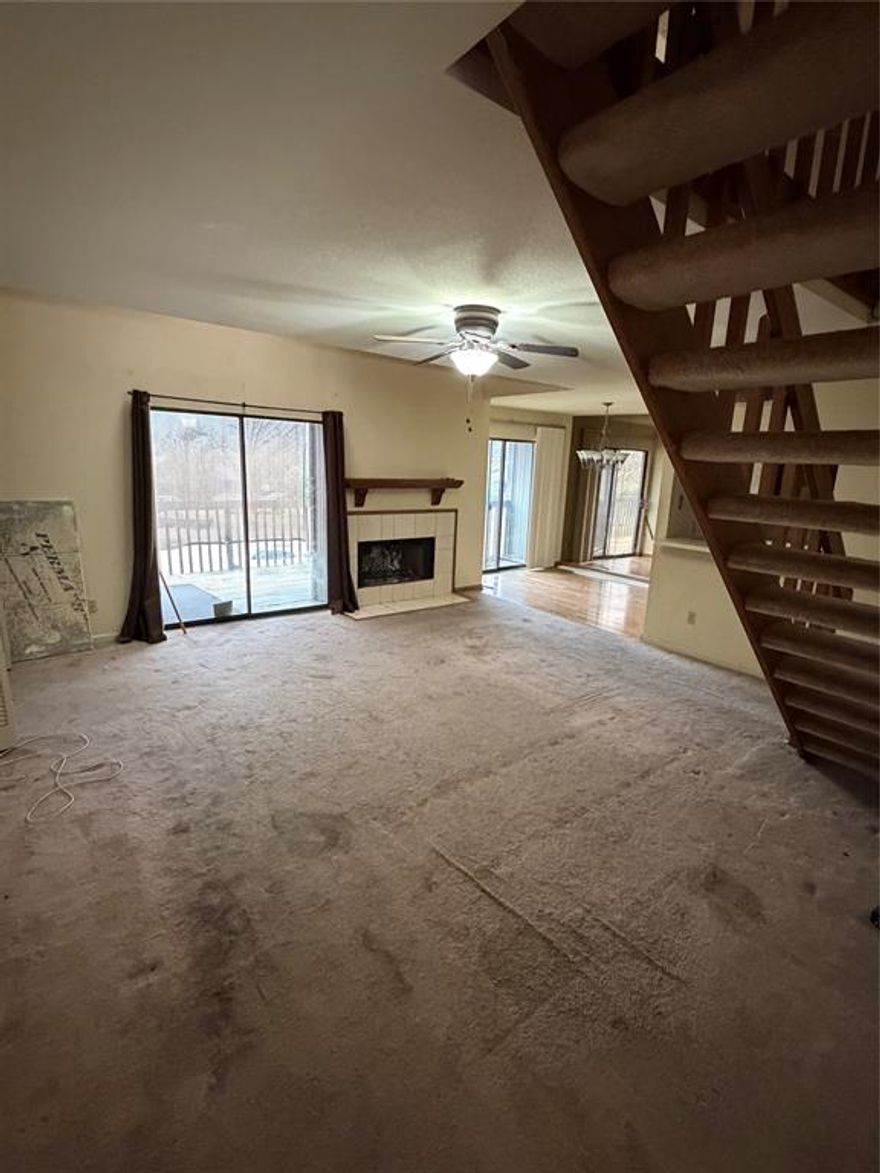 Investor Opportunity Fixer-Upper. 3-bedroom, 2-bath condo located in the gated Signal Ridge community, within walking distance to The Harbor and Lake Ray Hubbard. Dining area features laminate flooring, mirrored wall, and glass doors to deck. Living area includes fireplace and glass doors to deck with water view. Primary suite offers jetted tub, double vanities, and large walk-in closet. Upstairs includes loft area with extensive built-in shelving. Community amenities include four pools and clubhouse. Sold AS-IS. Cash or hard money preferred. No repairs will be made. Buyer to verify HOA, schools, square footage, and all MLS information.