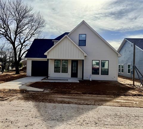 Photo of 203 Cherry Street, Nocona, TX 76255 (MLS # 21079426)