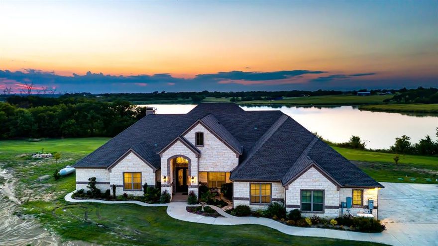 Don't miss this rare opportunity to enjoy over 46 acres of lake front property with a beautiful custom home just minutes from town. Whether you're looking for space to graze your cattle, plant an orchard, build a second home, office or barn, this property has the space you need. And why not have the views too? Keep an eye out for the local bald eagles that have been known to visit! The custom home has been designed with a keen eye for all the finer things. Soaring ceilings create a grand open living space. The hall archways and floor to ceiling stone fireplace are sure to draw your eyes.  Custom kitchen cabinetry with inset lighting, quartzite countertops, double ovens and plenty of island space make this great for entertaining. The back of the home faces Emerson Lake so you will always have a great view from both living areas, kitchen, dining and primary bedroom. The master is a dream with arched ceiling and spa-like en-suite bath. Two of the secondary bedrooms have full en-suite baths. When you're through in the house, don't miss the amazing Garden Cottage with adjoining garden designed by a true Master Gardener! Keep the cottage as-is or convert to a tiny home or office. There is a half bath and closet for storage! Main home boasts 4,292 sq ft plus an additional 480 sq ft in the Garden Cottage for a total of 4,772 sq ft as shown on Collin CAD. There are too many amazing features to list for this property. Come see what this property has to offer. You won't want to leave this paradise! 

Brand new survey is available.