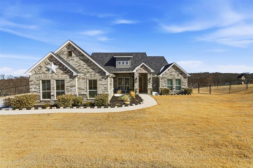 Perched atop a hill on a quiet cul-de-sac, this one-owner home offers privacy, elevated views, and a like-new feel throughout. The thoughtfully designed open floor plan is ideal for both refined entertaining and everyday comfort. The kitchen is the heart of the home, featuring quartz countertops, an oversized island, and abundant cabinetry, flowing seamlessly into the main living space. The private primary suite is a true retreat with a massive walk-in shower and spa-like ambiance. With four bedrooms and two full baths, the layout is both functional and elegant. Additional highlights include a 3-car garage with epoxy-coated floors, full sprinkler system, fresh sod, and an exceptionally peaceful street. Impeccably maintained and barely lived in—this home is truly move-in ready.