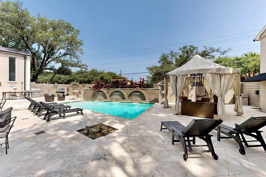 Located in the gated Paradiso Condos community, this meticulously maintained top-floor unit is spacious & move-in ready! Situated in a convenient North Dallas location minutes to SMU, Preston Hollow Village, NorthPark & White Rock Lake. Featuring an open layout with vaulted ceilings, bamboo wood floors & 3rd bedroom or flex space. Updated kitchen equipped with SS appliances, granite countertops, travertine tile floors & breakfast bar overlooking the dining area. Double doors off the kitchen open to a quiet balcony with one of the best views in the complex. Additional bedroom off the kitchen could be used as a guest room, office, workout space, media room… Endless opportunities! Primary bedroom with ensuite bath featuring a frameless glass shower & massive walk-in closet. Secondary bedroom also has ample closet space & easy access to full bath with tons of counter space, storage & a jetted tub. Secure & covered parking assigned to the unit. Enjoy outdoor living with two enclosed patios, grilling area & a resort-style pool with cabanas + lush landscaping. All in a highly convenient location minutes to Uptown & Downtown Dallas, near biking & jogging trails, grocery stores (steps from Trader Joe’s), plus all the shopping, dining & entertainment that central Dallas has to offer.