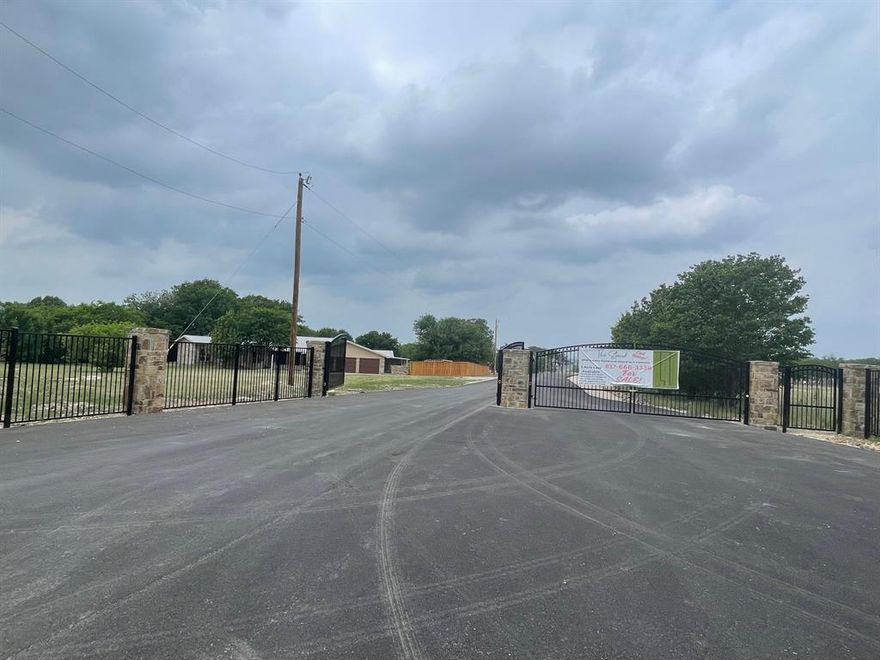 Rare opportunity to own a full 1-acre homesite in a private gated community, an increasingly hard-to-find offering in the heart of the city, yet considered outside city limits. Enjoy the perfect blend of space, privacy, and convenience with room to build your dream home exactly how you envision it.
This quiet, exclusive neighborhood features only 17 homesites, creating a peaceful, low density environment with a true sense of privacy and community.

Each lot is designed for independence and flexibility, featuring individual well and septic systems, no city utility restrictions. Whether you prefer to bring your own approved builder or work with our custom home builder, you’ll have the freedom to create a home as distinctive as your lifestyle.

Ideally situated just 20 minutes from downtown Fort Worth and only 30 minutes to Dallas Fort Worth International Airport, this location offers easy access to major amenities while maintaining a peaceful, spacious setting.
Electric and fiber optics at the street. 

Don’t miss your chance to secure one of these limited 1-acre lots—build now or hold for the future in a highly desirable area.