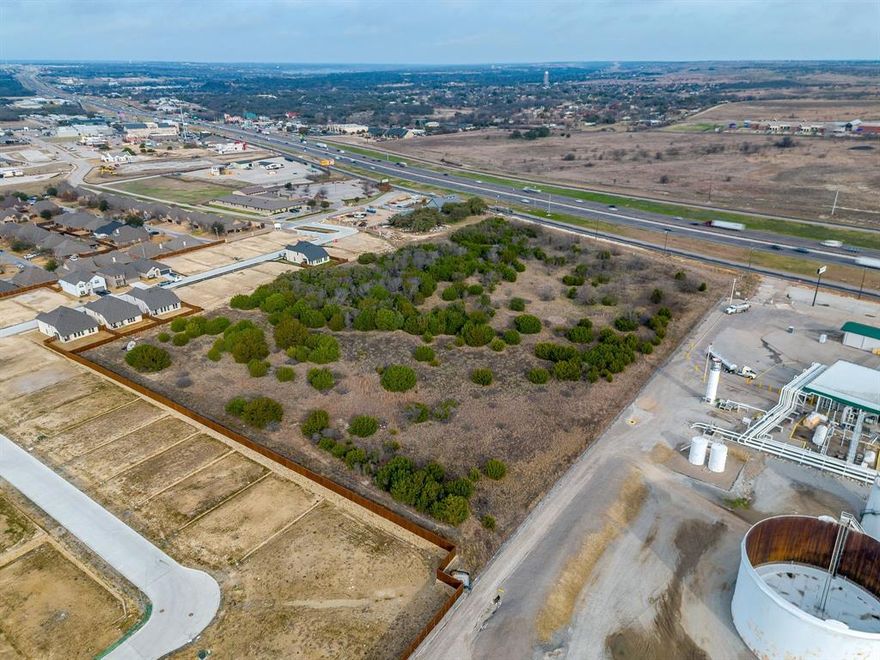 Ideally situated in Aledo, Texas along the I20 Service Road, this prime property offers exceptional visibility and convenient easy on & easy off access to the interstate. Located just down the road from the Brookshire’s grocery store, Starbucks, nearby dining, and shopping options, the site also provides quick connectivity east toward FM 1187, the main corridor leading directly into the Aledo town center. With its strategic positioning and strong accessibility, this location presents an outstanding opportunity for commercial development.