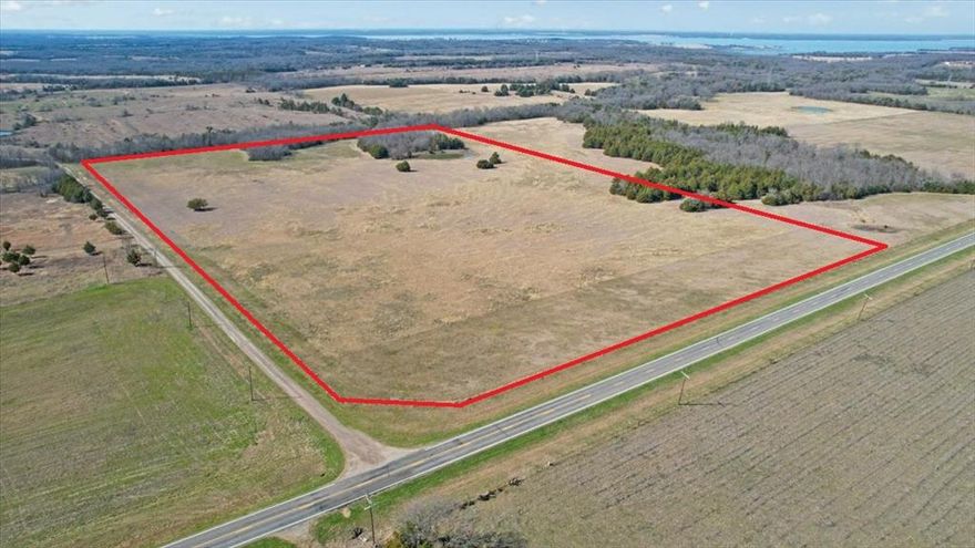 Prime for development and just a few miles from the FM 1396 south boat ramp on Bois d' Arc lake and Five points subdivision. This corner lot with roughly 1000 feet of frontage on FM 1396 and roughly 1600 feet of county road frontage on CR 2992 is perfect for investment, ranching or developing. Beautiful terrain with amazing views make this property suitable for multiple uses. This is the south end of a larger parcel and there is up to 322 acres total. Seller is open to different subdivision scenarios so come take a look and see how you can make it fit your plans.