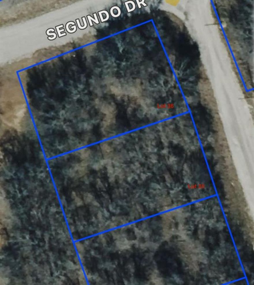 Treed lot in Runaway Bay TX.  Build your dream home just minutes from Lake Bridgeport where you can enjoy fishing and water activities.  Close to community pool.  Lot 36 is also available so you can have more privacy or room to roam. No RV's or mobile homes. Easy commute to Jacksboro, Denton  and Fort Worth.