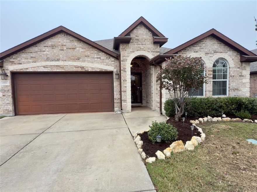 This very beautiful and well maintained 4-bedroom, 2-bath home is located in the highly sought after Eagle Ranch, just minutes away from Eagle Mountain Lake and Lake Worth shopping and dining. This home features an open concept main area with a gas fireplace, separate dining, and large eat-in kitchen with more than enough counterspace as well as a 5-burner gas range with skillet. The bedrooms are split for ultimate privacy, with the master bedroom on the west wing of the home and the secondary bedrooms on the east. All bedrooms have a large walk-in closet with built-in storage and hard surface flooring. The master suite is expansive- hosting an ensuite with dual sinks, a large garden tub, separate shower, and oversized closet. The back patio is covered, north facing to catch the perfect amount of indirect sunlight. The yard has a newly painted privacy fence and plenty of room for playtime! Enjoy the community offerings: stocked fishing pond, disc golf, & playgrounds!