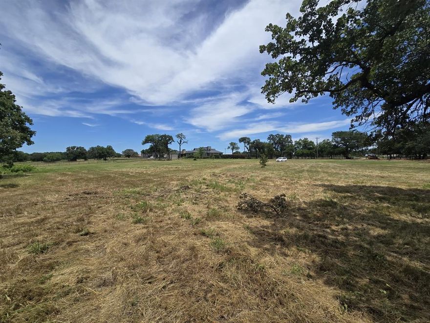 **** At the Intersection of FM1171 and Red Rock Lane ***
Approximately 10 acres of horse property with Sandy loam soil. A rainwater fed rejuvenating pond on 1.5-2 acres with plenty of fish - migratory Canadian ducks and other wildlife including deer nearby. 

This refreshing 10-acre land is available in the heart of Flower Mound at intersection of FM1171 and Red Rock Lane. 

Perfect location for someone to 
1) Build a big house facing pond - another living quarter and have horses or other animals on the property 
2) A big church with plenty of area for young - teenage volunteers. Conduct summer camps.
3) Someone to own a small Texas ranchette and is surrounded by wildlife.
4) With town approval, use it as a *Dude ranch* with animals. Please contact town of flower mound to see all possible *special use* options. 
5) For a builder - developer to build 2-3 luxury houses with town approval   

About 3.3 acres on Red Rock Lane and FM1171 is and about 0.75 acres on southwest side (By FM1171 and Glen Oaks) is also out of flood plain.  
Additional 1-1.5 acres can be used for parking if needed.

**** Note: Please see the documents in the Transaction Desk ****   Knee high boots are required to enter the property, please use caution.