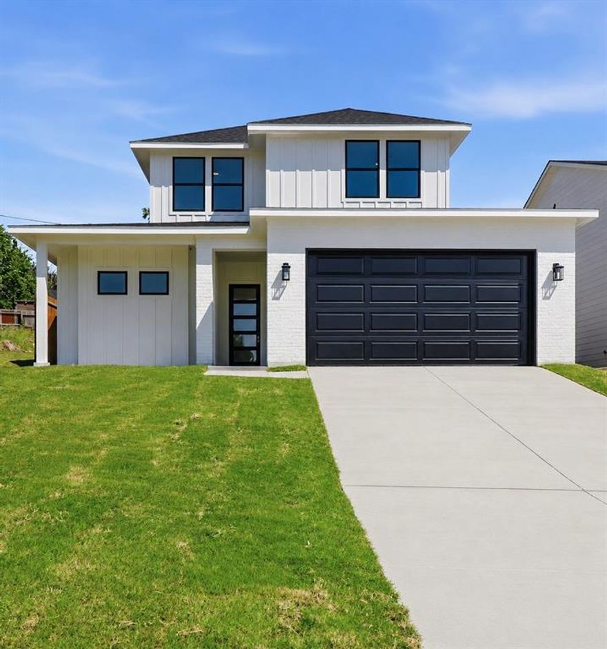 Luxury meets functionality in this beautifully crafted modern new construction featuring 3 bedrooms, 2.5 bathrooms, and thoughtfully selected finishes throughout. The open-concept layout is ideal for both entertaining and everyday living, with a spacious living area that flows effortlessly into the designer kitchen, complete with custom cabinetry, sleek details, and a hidden walk-in pantry for added storage and a seamless look. The well-designed floor plan includes a Jack-and-Jill bathroom connecting the secondary bedrooms, while the private primary suite offers a relaxing escape with a large soaking tub. Designer touches include tray ceilings, grand 8-foot doors, abundant natural light, laundry room with a built-in sink and custom cabinet space, enjoy energy-efficient features that complement today’s lifestyle. Exceptional craftsmanship is evident throughout. Conveniently located in a growing Dallas area with easy access to major highways, shopping, dining, and everyday essentials, this home offers the perfect blend of style, comfort, and convenience.