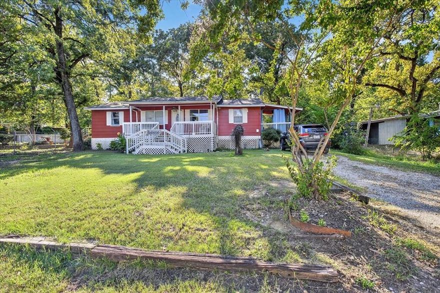 Charming home situated across the street from the lake on three  parcels, +or -  half an acre. Great opportunity for buyers willing to do some work, lots of potential, needs work, being sold as is.  The kitchen has been nicely updated with solid surface countertops, stainless style stove, microwave and updated cabinets.  Spacious add on living room at the back of the home features a stunning wall to wall fireplace, beautiful mantle, great focal point and tin on the ceiling. Split primary bedroom has an adorable covered patio, you will love it. Engineered wood flooring in the dining room, kitchen, hallway and living room. Enjoy multiple outdoor spaces, 3 patios total, in addition to the front porch, mature trees and plenty of room to make this property your own.  Wonderful above ground pool with decking and lots of trees and plants  to enjoy the hot Texas summers. With some TLC, this could be your retreat.   Buyer will need to buy a new survey, seller does not have one. Home being sold as is.  Financing fell through, please bring your cash buyers, lots of potential.  

Property to include Lots 25 and 26 Tanglewood Beach and lot 57 Tanglewood Beach 2 faces Bernie Dr