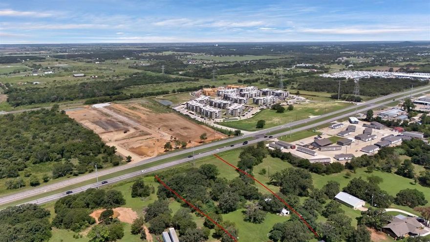 Discover this exceptional parcel of land located just 10 minutes from the thriving city of Cleburne. Offering a blend of open areas and mature trees, the property is high and dry completely outside any flood zones and easily accessible from Main Street. Zoned Commercial Industrial Flex District, it is bordered by SF-4 residential parcels, presenting a promising opportunity for potential rezoning to residential use.