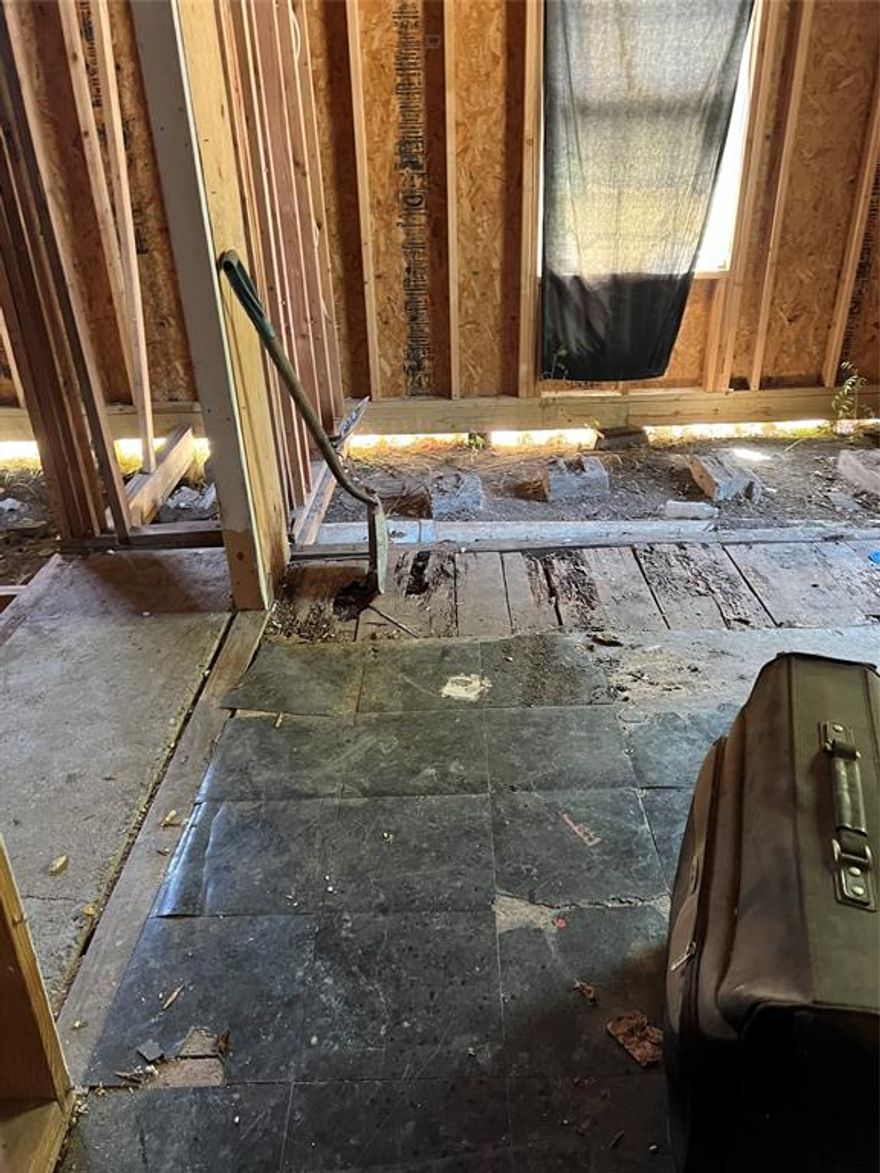 This home has been updated on exterior including roof about 2 years old. The exterior paint done. The rest is up to you.  Interior is gutted so you can make it what you want it to be. No showing on interior until offer to purchase. Subfloor is missing but seller is leaving some extra material for sub floor. Call agent with all questions. Priced to sell and when you are done with the interior you will have a brand new home.