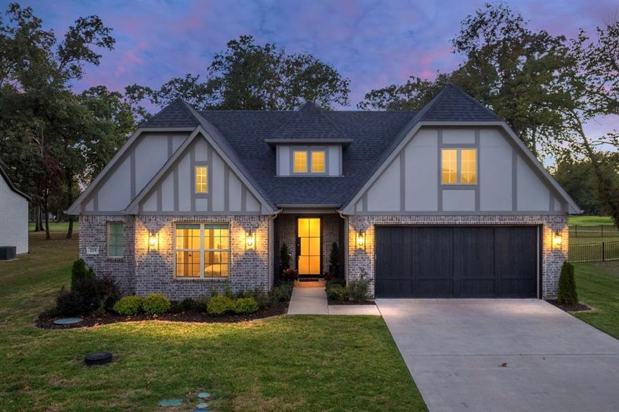 This exceptional home will truly take your breath away! From the moment you step through the grand entryway, you’ll feel right at home — surrounded by warmth, style, and thoughtful craftsmanship. Hardwood floors flow throughout the open-concept design, connecting elegant living spaces and capturing panoramic views of the pristine golf course. Every detail has been carefully considered, from the dedicated bar area perfect for entertaining, to the guest powder bath tucked away for privacy.  The chef’s kitchen features a Bertazzoni 36” gas range, custom vent hood, oversized island, gold-tone fixtures, and calcutta diamond countertops, combining both luxury and functionality.  The primary suite offers a private retreat, complete with an incredible closet with direct laundry access. Outside, the covered porch with brick pavers is the perfect spot to relax and enjoy the view.  Additional highlights include: dedicated golf cart garage plus a 2-car garage, gas fireplace, pre-wired for surround sound and six security cameras, 220-amp wiring for an EV charger and separate circuit and timer for seasonal lighting.  Every element of this home has been designed with timeless quality and comfort in mind. They truly thought of everything!  Special owner upgrades include: Tuffskin marble covering, iMistAway insect misting system, outdoor kitchen and designer wallpaper and electric blinds.  So why are the owners moving? They love Pinnacle so much, they have decided to make this their primary home and needed more space for their very large exteded family.