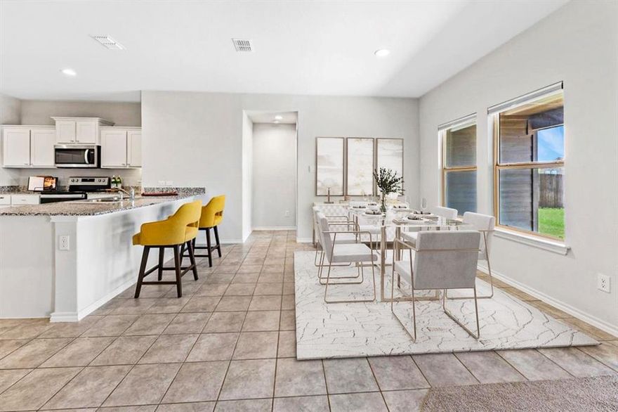 Built in 2023, this modern five-bedroom home on Firedog Drive checks all the boxes. Open layout, tall ceilings, great natural light, and a kitchen with granite counters, a big island, and upgraded appliances—all flowing right into the dining and living space.
The primary suite offers quiet separation, and the other four bedrooms give you plenty of options for guests, work, or hobbies. Out back, enjoy an extended covered patio and a large fenced yard that’s easy to maintain.
Smart home features, energy efficiency, and low-maintenance finishes make everyday living easy. And when you’re ready to venture out, enjoy access to the neighborhood’s resort-style amenity center—4.5 acres of fun including two pools with water slides, splash zone, playground, and more.