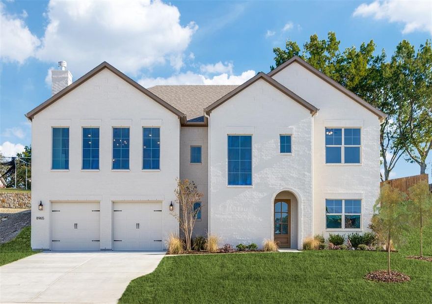 This stunning residence is one of very few in the metroplex featuring a true walk-out basement, offering incredible flexibility and lifestyle options. Perched on a prime homesite, this house captures fabulous views from the main living level, creating a light-filled open space. The basement level is ideal for entertaining and includes a private guest retreat and second living space. The heart of the home lies within the chef's dream kitchen, that boasts an expansive eat-in kitchen island, designer pendants and stainless steel appliances. From the stairway to the living room, this home has an unbelievable amount of natural light that is let in through the expansive windows. The primary suite, which overlooks the backyard, is quite spacious and has the most beautiful en suite bath. With a freestanding tub and shower, the bath features white and bright quartz and tile and creates a spa-like setting. The primary closet is built with custom shelving and hanging rods, allowing for maximum storage and organization. This home is the ideal setting for large group entertaining or cozy nights at home with family. There are two separate living areas, one which lends itself to a great game room space downstairs. This thoughtful floor plan is located on a cul de sac and is quiet and safe, allowing for children to play comfortably outdoors. The backyard is fenced and landscaped, maximizing the space for a great area for outdoor use. Clarity Homes to provide a seller incentive of $18,000 to be used towards closing costs, rate buy down, or pre paids when financing through Builder Mortgage Direct. Buyer will also receive a Builder Mortgage Direct Lender Credit for the title policy! Come tour this property to take in the breathtaking view of the Fort Worth skyline!