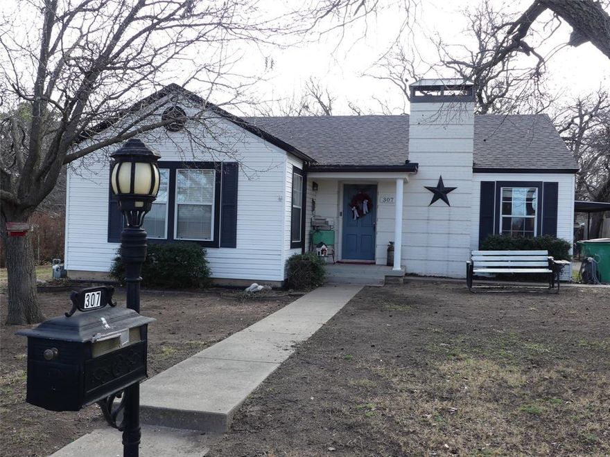**OPEN HOUSE TODAY 1-3. Owner says SELL! HUGE price reduction. Price reduced to $219,900 AND sellers may pay up $5,000 in buyers closing cost. **  Room to roam in this comfortable home. This updated 3-bedroom, 2 bath home also has 2 living areas. Main living area has a gas fireplace to keep you warm on those cold winter days. The primary bathroom has 2 closets with mirror doors, jetted garden tub, and separate shower.  The bedrooms are large. LVP throughout living areas, carpet in the bedrooms. The lawn is big enough for the kids to play or to entertain, but not so large that it takes hours to keep it manicured. The large laundry room has built-in cabinets with a folding area on top. There is also a rack so you can hang clothes to dry. There is room for a fridge or freezer with a waterline hookup for an extra ice maker. The home is located just off of Buss 287 so you have quick access to a major highway. It is also just across the street from Bowie Middle School. LOTS of extra lawn that you don't have to mow! Contact your Realtor today. This home has been reduced to sell quickly.