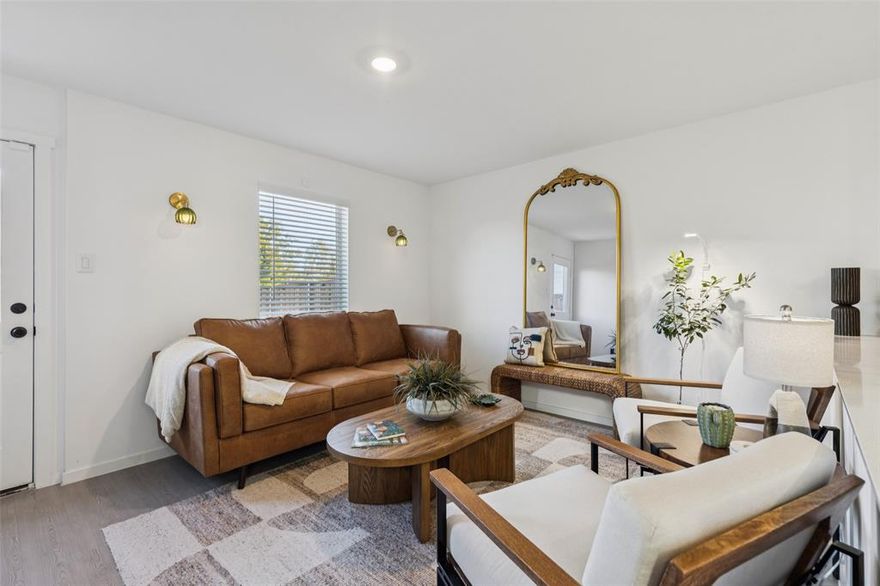 Home features an assumable 4.1% loan (contact listing agent for details). This like new 3-bedroom, 2.5-bath home that offers thoughtful upgrades throughout. The light-filled living area sits at the center of the home, creating a comfortable space for everyday living or entertaining. The kitchen is both functional and inviting, featuring a breakfast bar with seating, built-in appliances, and ample storage for daily use. The primary suite provides a relaxing retreat with an ensuite bath and walk-in closet. Two additional bedrooms offer flexibility for guests, a home office, or additional living space. Step outside to a private backyard with plenty of room to enjoy the outdoors. This home is equipped with modern smart-home features, including smart switches, a smart front door lock, Nest thermostats, and ADT security with front and rear cameras. Additional highlights include a tankless water heater, full guttering, front and back irrigation, and built-in pest control tubing. The HOA includes fiber internet service. Conveniently located near parks, shopping, and dining, this move-in-ready home offers comfort, functionality, and value. A 3D tour is available online. Washer, dryer, and refrigerator included with an acceptable offer.