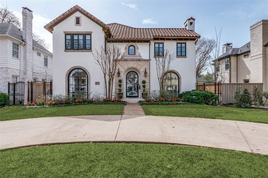 This fabulous Spanish Colonial style home in University Park features a center hall plan with large living and dining areas perfect for entertaining.  Gourmet kitchen with stainless steel appliances, large island, double sinks, butler’s pantry and wet bar opens to a spacious breakfast room with built in window seat. Gracious family room has beamed ceilings, hand scraped hardwoods, arched doorways and French doors that open to stunning outdoor living area complete with flagstone patio, built-in grill, gorgeous pool and dog run with turf. Lovely formals, private study with built-ins, and a separate office off the kitchen complete the first floor.  Upstairs includes large master suite with vaulted ceilings, three additional bedrooms and laundry room. There is a separate staircase off kitchen to gameroom with full bath that could be fifth bedroom.  Located on a wonderful family block in Hyer Elementary and HPISD and walking distance to local restaurants and shopping.
