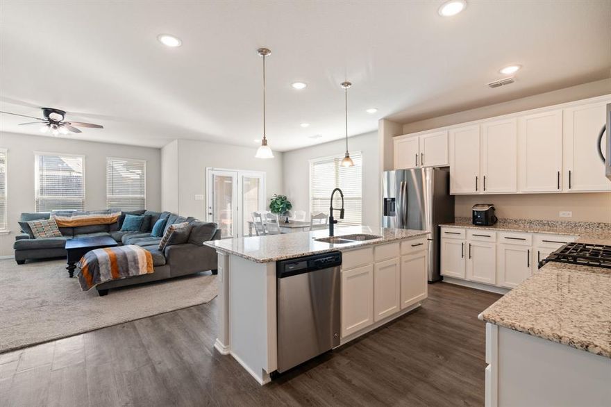 2.75% FHA assumable loan is available for qualified buyers. Contact the listing agent for additional details. Built in 2021, this well maintained home offers the perfect blend of modern comfort, energy conscious design, and easy everyday living. The kitchen features abundant cabinetry and pantry space, plus gas cooktop, granite counters, and large island with seating. The split floor plan provides the right amount of separation, with two comfortably sized secondary bedrooms and a primary suite that can accommodate a cozy sitting area or desk. The primary bath features a large walk-in shower, dual sinks, and generously sized primary closet. Outside, the oversized lot gives you extra breathing room and plenty of space to create that cozy backyard oasis you've been picturing. The 2.5 car garage is an added bonus for storage, tools, bikes, or workspace. Additional features of this home include: carpet in primary bedroom and living room replaced in 2023, luxury vinyl plank flooring in kitchen, dining, hallway, laundry, and bathrooms, matte black Delta faucets and fixtures, 6 additional 110V outlets and two 220V outlets in garage, insulated garage walls, tankless water heater, separate oversized closets for both partners in the primary bath, ring doorbell, and so much more! Don't miss out - schedule your showing today!