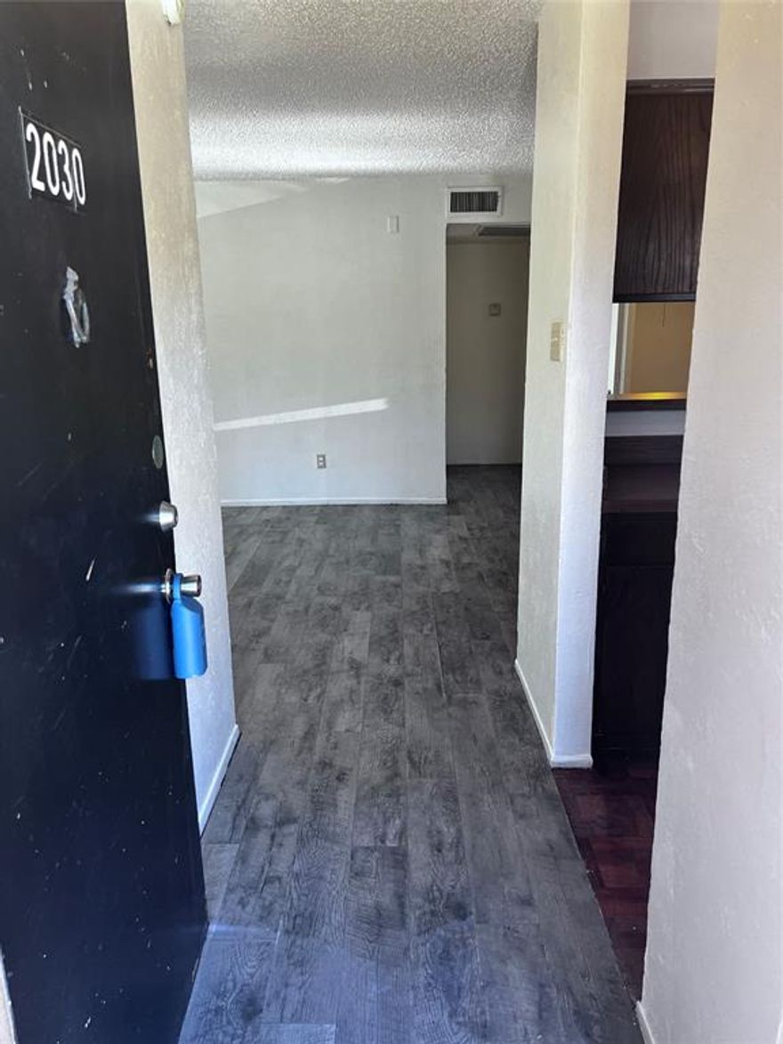 CALLING ALL INVESTORS!!! Great investment opportunity!! Spacious 2 bedroom and 2 full bathroom Condo (962 sq ft - largest floor plan in the subdivision) with fresh paint, laminate flooring and a private balcony. Wood burning fireplace in Living Room. Additional living area would be perfect for a desk-office space. Kitchen overlooks dining area. Full size washer and dryer connections in Utility closet off of the Dining area. Great location. Close to SMU, Dallas College Richland Campus, Lake Highlands shopping center, restaurants, schools, Lake Highlands Community Center, Walnut Hill train station and North Park Mall. Priced to sell quickly. Sold As-Is.