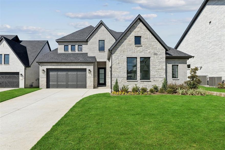 SOUTHGATE HOMES BRENHAM III floor plan.  This popular floor plan with a true three car garage is situated on a Cul-de-sac lot with curb appeal for days! We invite you to tour this fabulous home with room for everyone. A striking iron front door welcomes you inside where you are met with a grand entry that boasts high ceilings and an impressive open stair case that showcases the soaring vaulted ceiling in the Family Room filled with natural light from the 15' Sliding Glass Door to your private covered porch. The 50 inch linear fireplace with floor to ceiling tile is a showstopper! The kitchen steals the spotlight featuring quartz countertops, Kitchen Aid appliances, double ovens and a generous Pantry. Retreat to the owner’s suite, a haven of luxury complete with our our Signature Bath featuring a double vanity, oversized freestanding soaking tub, walk through shower adorned with multiple shower heads, and two walk-in closets. Entertaining is a breeze in this home with a Game Room and Media Room upstairs! All located in the highly desired Painted Tree Community. Featuring all outdoor amenities including miles of nature trails, pump track trails and community pools. MOVE IN READY NOW!