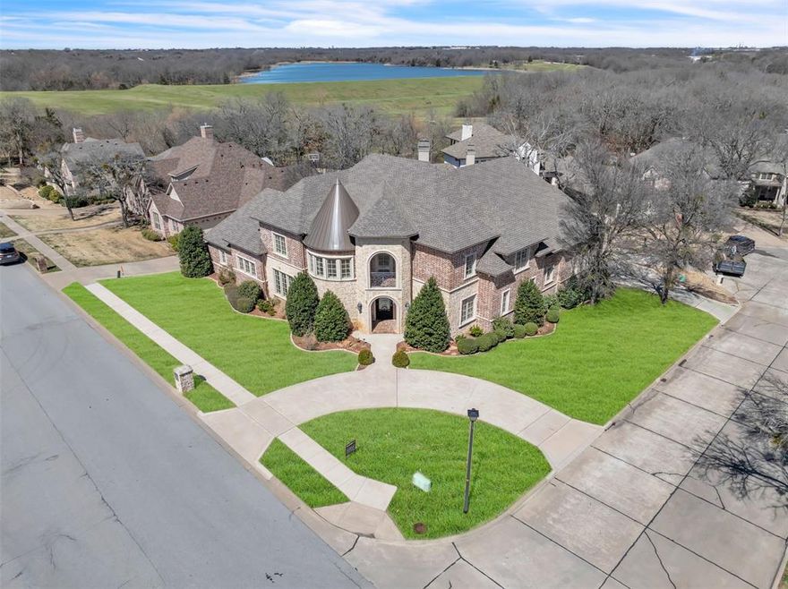 Introducing 2909 Canyon Creek, a stunning custom home offering 4,731 sqft of luxury living. This exquisite property features 4 spacious bedrooms, 3.5 bathrooms, beautiful home office space, and a dramatic dining room with soaring 20-foot ceilings. The grand custom kitchen boasts detailed cabinetry, plenty of counter space with beautiful granite countertops, perfect for culinary enthusiasts. For entertainment, enjoy a dedicated movie room. Outside, a custom pool with a breathtaking waterfall feature awaits, complemented by a spacious patio ideal for hosting gatherings. The home sits on a prime corner lot, complete with a 3-car garage and picturesque views of the community pond just across the street. This is truly a one-of-a-kind home, blending elegance and functionality in an unbeatable location. BONUS FEATURES: A brand-new roof and gutters were installed in July 2023 for peace of mind. The home also includes a commercial-grade Wi-Fi system providing 100% coverage throughout—no dead zones! Outside, enjoy a state-of-the-art, Wi-Fi–enabled smart pool and spa, complete with a full pool heater, built-in floor cleaning system, and pier-anchored construction to bedrock for lasting quality. Designed and built by Allison Pools—the same team behind the Choctaw Casino pools—this backyard is truly a showstopper.