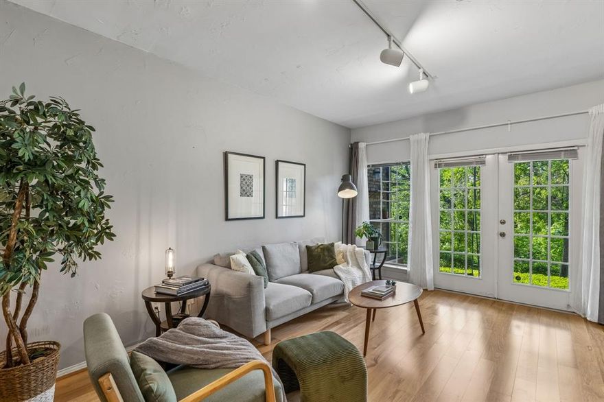 Stylish, light-filled, and backing to a peaceful greenbelt, this first-floor condo checks all the boxes. Featuring 2 bedrooms and 1 bath, the home offers an open layout with warm wood floors, a spacious kitchen with granite countertops, stainless steel appliances, and a large island perfect for gathering. The real standout? The serene, tree-lined views from your private patio, rare for condo living and perfect for morning coffee or winding down in the evening. With generously sized bedrooms, updated finishes, and a location that puts you minutes from North Dallas, Addison, and major highways, this is an easy choice for anyone looking for comfort, convenience, and a little bit of nature right outside their door. Inside, you’ll find warm wood flooring throughout the main living areas, an open-concept layout, and abundant natural light that creates an inviting, airy feel. The kitchen features granite countertops, stainless steel appliances, ample cabinetry, and a large island that seamlessly connects to the living and dining spaces. Perfect for everyday living and entertaining.