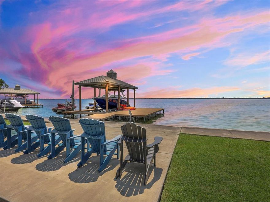 This beautiful home is nestled in the heart of Rockwall & epitomizes lakeside luxury. Featuring 5 bedrooms and 4.1 bathrooms, it provides ample space for family & guests. The inviting backyard boasts priceless lake views, pool & spa, fire pit, pergola, plus a grill, All of this coupled with a boat dock fitted for a boat & jet skis creates the perfect ambiance for lakeside relaxation & entertaining. Inside, the open-concept design seamlessly integrates the family room, dining area & gourmet kitchen with a large island complete with waterfall quartzite counters & double dishwashers. Downstairs also features a spacious bedroom with lake views & ensuite bath, an office & laundry room with custom cabinetry. Enjoy true tranquility in the owner’s retreat with stunning views of the lake. Relax & enjoy additional lake views on the screened-in balcony & flex room with a custom bar. This remarkable home’s prime location is minutes from downtown Rockwall, golf course, pickle ball & tennis courts.