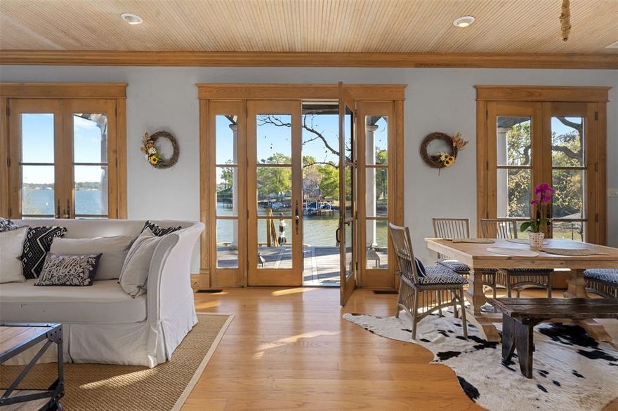 Spectacular fully furnished, one-of-a-kind lakefront retreat on Cedar Creek Lake. This stunning home is filled with character and thoughtful details, including 10-foot ceilings downstairs, vaulted ceilings upstairs, beautiful wood flooring, tongue-and-groove ceilings, crown molding, custom cabinetry, and multiple French doors that open to expansive outdoor living spaces. Located in the highly sought-after Arnold Hills community, this property is ideal for entertaining family and friends. The spacious open floor plan features an inviting eat-in kitchen with stainless steel appliances, granite countertops, and a large island with breakfast bar. The family room offers a warm and welcoming atmosphere with a wood-burning fireplace and ornate mantel. Generously sized bedrooms feature vaulted ceilings and plantation shutters, creating comfortable and stylish retreats throughout the home. The lakefront features a large multi-level deck overlooking the water, offering breathtaking lake views at any time of day. Whether hosting gatherings or enjoying peaceful lakeside living, this exceptional property delivers the perfect Cedar Creek Lake lifestyle.