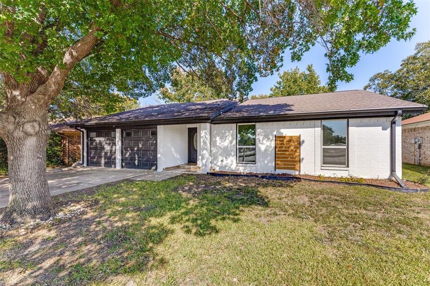 This beautifully updated home is move-in ready and packed with modern upgrades! Step inside to discover an open-concept living area with a fireplace and a custom accent wall. The kitchen is a true showstopper - complete with stainless steel appliances, granite countertops, pot filler, wine cooler, pantry, and soft-close cabinets and drawers. The spacious primary suite has a custom accent wall that adds a designer touch and a spacious walk-in closet. A stylish barn door leads to the utility room with sink, and the washer and dryer convey. LVP throughout the home and there are two storage sheds in the backyard that provide an abundance of extra storage space. This must see home is located across from Foster Village Park and is just minutes from 820 and 377.